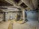 View of an unfinished basement with concrete walls, ceiling, and plastic vapor barrier at 1368 Scott Blvd, Decatur, GA 30030