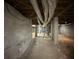 An unfinished basement featuring concrete walls and ceiling with exposed ducts and pipes at 1368 Scott Blvd, Decatur, GA 30030