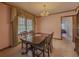 Comfortable dining area with a large window, offering ample natural light and a view to the living room at 1368 Scott Blvd, Decatur, GA 30030