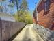 A view of the home's driveway, and the brick and stone exterior of the home at 1368 Scott Blvd, Decatur, GA 30030