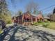 Brick home with long driveway and a yard at 1368 Scott Blvd, Decatur, GA 30030