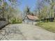 A detached garage with three bays and concrete parking area at 1368 Scott Blvd, Decatur, GA 30030