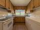 Kitchen with wood cabinets and laundry at 1368 Scott Blvd, Decatur, GA 30030