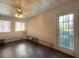 Bright sunroom with large windows, a ceiling fan, and a vintage heater offers versatile living space at 1368 Scott Blvd, Decatur, GA 30030