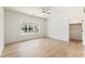 A bright room with hardwood floors, a large window with a view, and access to a walk-in closet at 312 Meadow Dr, Alpharetta, GA 30009