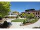 Scenic outdoor green space with landscaping, a building, and walking paths at 312 Meadow Dr, Alpharetta, GA 30009