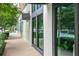 Exterior view of The Woodhouse Day Spa with modern brick architecture at 312 Meadow Dr, Alpharetta, GA 30009