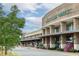 Exterior shot of Whole Foods Market building with landscaping and storefront at 312 Meadow Dr, Alpharetta, GA 30009