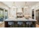 Well-appointed kitchen with a large island, marble countertops, and custom cabinetry at 312 Meadow Dr, Alpharetta, GA 30009