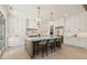 Modern kitchen featuring custom white cabinetry, a marble island, and high-end stainless steel appliances at 312 Meadow Dr, Alpharetta, GA 30009