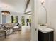 Open-concept living room with natural light, a modern sink, and sleek fixtures at 312 Meadow Dr, Alpharetta, GA 30009