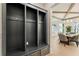 Mudroom with storage lockers and drawers for organization, open to a dining area at 312 Meadow Dr, Alpharetta, GA 30009