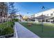 Exterior view of Avalon shopping center with outdoor seating and pedestrian walkways at 312 Meadow Dr, Alpharetta, GA 30009