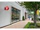 Exterior view of retail storefront with large windows and sidewalk at 312 Meadow Dr, Alpharetta, GA 30009
