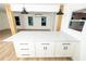 Kitchen island with quartz counters and black pulls at 4336 Parkview Dr, Lithia Springs, GA 30122