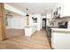 Bright kitchen features new stainless steel appliances, white cabinets, and a center island with counter seating at 4336 Parkview Dr, Lithia Springs, GA 30122