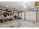 Spacious garage includes two garage doors, storage shelves and space for bikes and other recreational equipment at 6015 Crestwick Way, Cumming, GA 30040