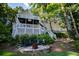 Spacious back yard with a fire pit and multiple levels of decking at 1187 Plantation Dr, Villa Rica, GA 30180