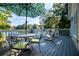 Relaxing outdoor deck with seating and a lake view, perfect for entertaining or enjoying the scenery at 1187 Plantation Dr, Villa Rica, GA 30180
