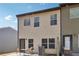Home's exterior boasts a cozy patio area, perfect for relaxation and outdoor dining experiences at 1901 Creel Ln, Atlanta, GA 30349