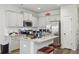 Modern kitchen with gray cabinets, stainless steel appliances, and granite countertops at 1901 Creel Ln, Atlanta, GA 30349