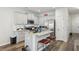 Stylish kitchen with gray cabinets, modern appliances, and a breakfast bar area at 1901 Creel Ln, Atlanta, GA 30349