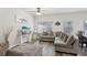 Inviting living room with a large sectional, stylish decor, and natural light at 1901 Creel Ln, Atlanta, GA 30349