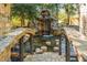 Backyard features a unique water feature with stone walkways and seating at 2461 Oak Grove Ne Ests, Atlanta, GA 30345