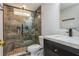Modern bathroom features a glass enclosed shower with a built-in bench and stylish vanity at 2461 Oak Grove Ne Ests, Atlanta, GA 30345