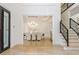Grand foyer leading to the dining room and staircase, features hardwood floors at 2461 Oak Grove Ne Ests, Atlanta, GA 30345