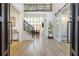 Grand foyer with hardwood floors, staircase, and open floor plan leading to the living area at 2461 Oak Grove Ne Ests, Atlanta, GA 30345