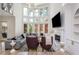 Spacious living room featuring large windows, fireplace, and stylish furniture at 2461 Oak Grove Ne Ests, Atlanta, GA 30345