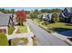 Street view of the house with a well-manicured lawn and landscaping at 2461 Oak Grove Ne Ests, Atlanta, GA 30345