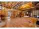 Unfinished basement with visible utilities, wood flooring, and potential for customized living space at 57 Sorghum Ct, Dallas, GA 30157