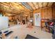 Large unfinished basement area with concrete floors, visible framing, and utilities, offering space for customization at 57 Sorghum Ct, Dallas, GA 30157