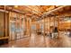 Spacious unfinished basement area with wooden framing, utilities, and laminated floors, offering potential for customization at 57 Sorghum Ct, Dallas, GA 30157