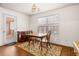 Cozy dining area with a view of the deck through the glass door, perfect for Gathering meals at 57 Sorghum Ct, Dallas, GA 30157