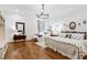 Spacious bedroom features hardwood floors, two beds, neutral decor, and lots of natural light at 891 Glenbrook Nw Dr, Atlanta, GA 30318