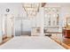 Spacious kitchen with marble countertops, stainless steel refrigerator, and custom glass display cabinets at 891 Glenbrook Nw Dr, Atlanta, GA 30318