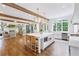 Open floor plan featuring a kitchen with large island, pendant lighting, and access to the living room at 891 Glenbrook Nw Dr, Atlanta, GA 30318