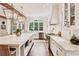 Gourmet kitchen with marble countertops, stainless steel appliances, and a spacious island with seating at 891 Glenbrook Nw Dr, Atlanta, GA 30318