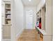 Functional mudroom with built-in storage, bench seating, and cabinet space for organizing golf equipment and accessories at 891 Glenbrook Nw Dr, Atlanta, GA 30318