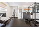 Well-equipped workout room featuring a variety of exercise machines and weights for a complete fitness experience at 891 Glenbrook Nw Dr, Atlanta, GA 30318