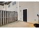 Enclosed back patio with privacy fence and access door to the property at 11352 Michelle Way, Hampton, GA 30228
