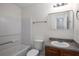 Modern bathroom features a clean sink, toilet, and bathtub at 11352 Michelle Way, Hampton, GA 30228