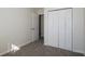 Cozy bedroom features an open door and closet at 11352 Michelle Way, Hampton, GA 30228