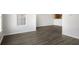 Bright and airy living room, complemented by hardwood flooring at 11352 Michelle Way, Hampton, GA 30228
