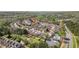 Aerial view of neighborhood with mature trees and community amenities at 411 Sureyya Dr, Canton, GA 30114