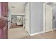 Inviting foyer with tile flooring leading to the living area with hardwood floors and an open floor plan at 411 Sureyya Dr, Canton, GA 30114