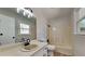 Functional bathroom with a single sink vanity, ample counter space, and a shower-tub combination at 4152 Berkshire Ct, Villa Rica, GA 30180